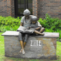 Park outdoor life size sitting bronze girl reading statue